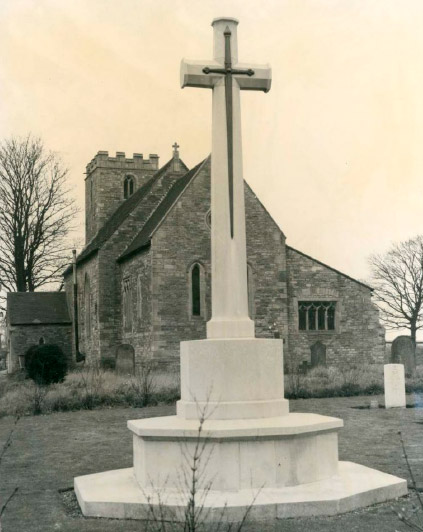 The Cenotaph, remembrance cross memorial within Scampton churchyard